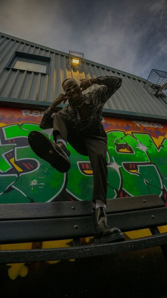 a man riding a skateboard up the side of a ramp