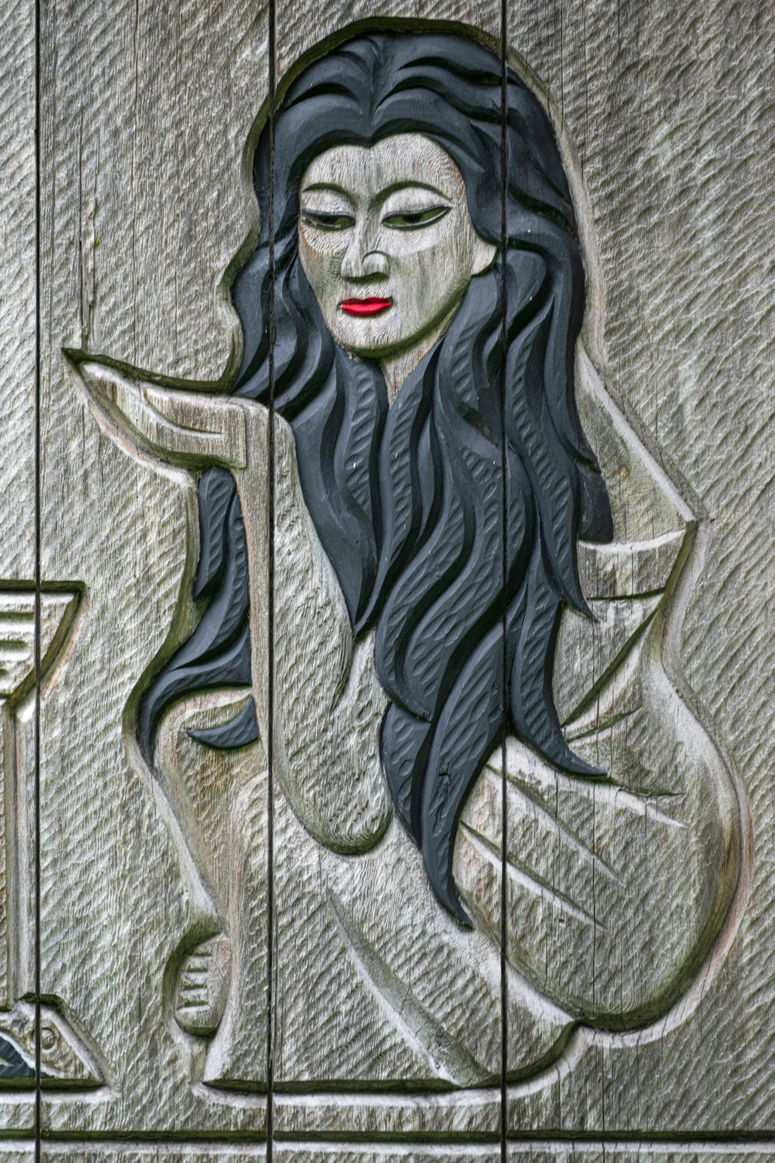 A painting of a woman sitting on a bench