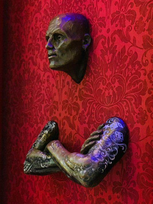 man themed statue ]