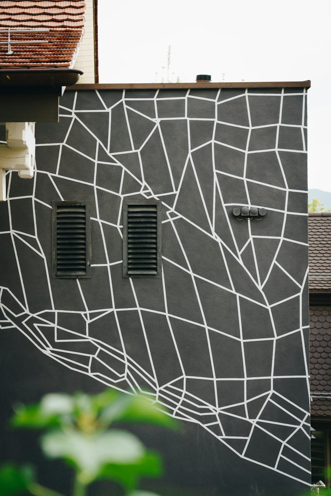 white and black tribal wall at the building