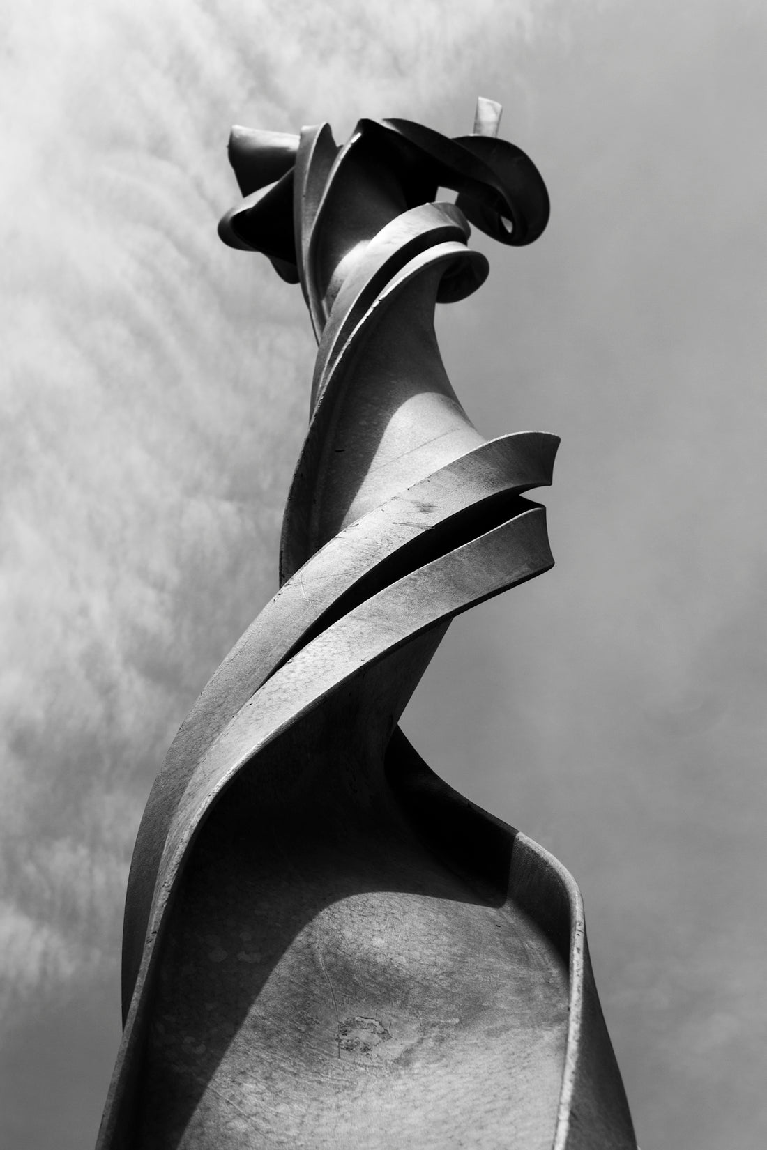 black and white photo of black leather peep toe heeled sandals