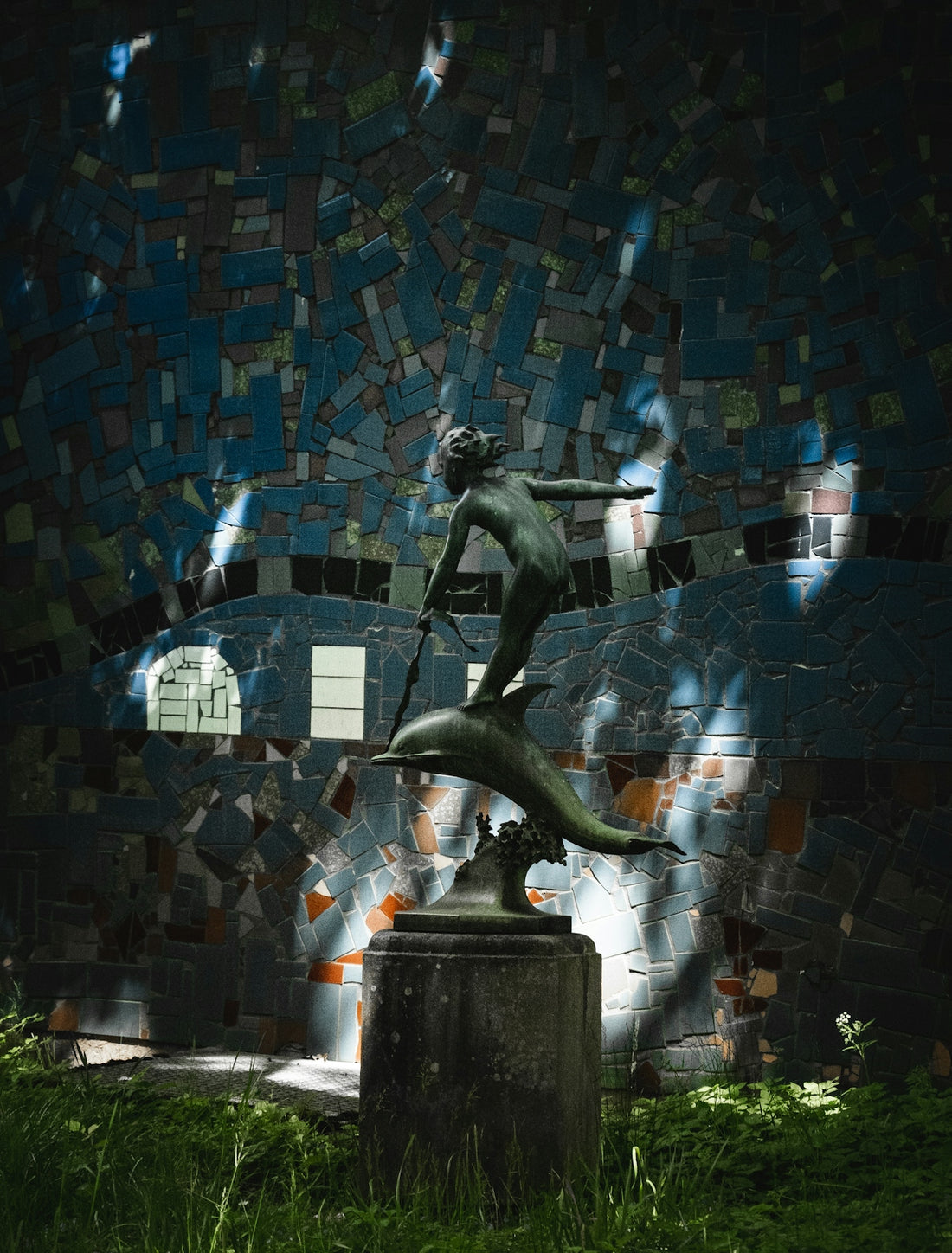 man and woman statue on water fountain
