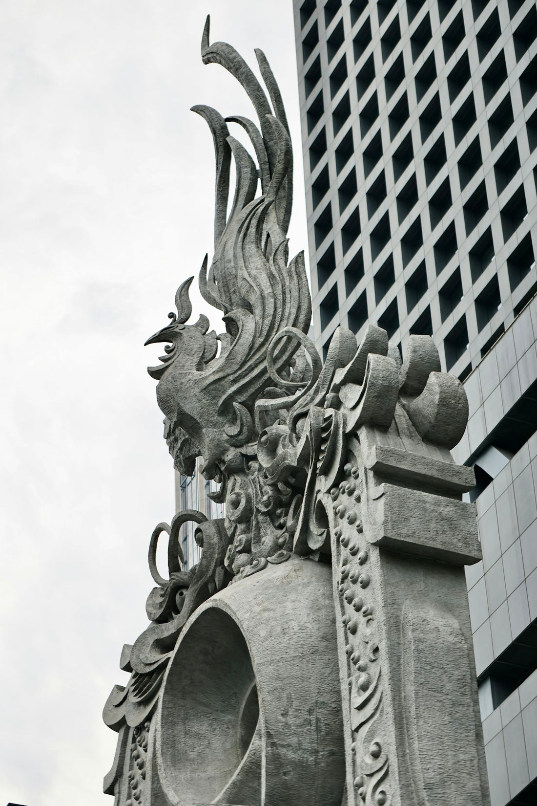 a statue of a person with a sword and shield