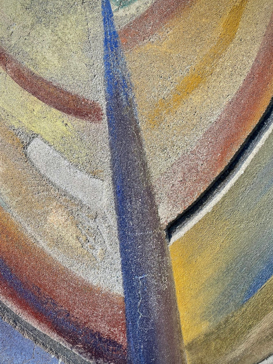 a close up of a street sign with a sky background