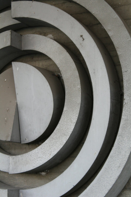 a close up of a circular object on a wall