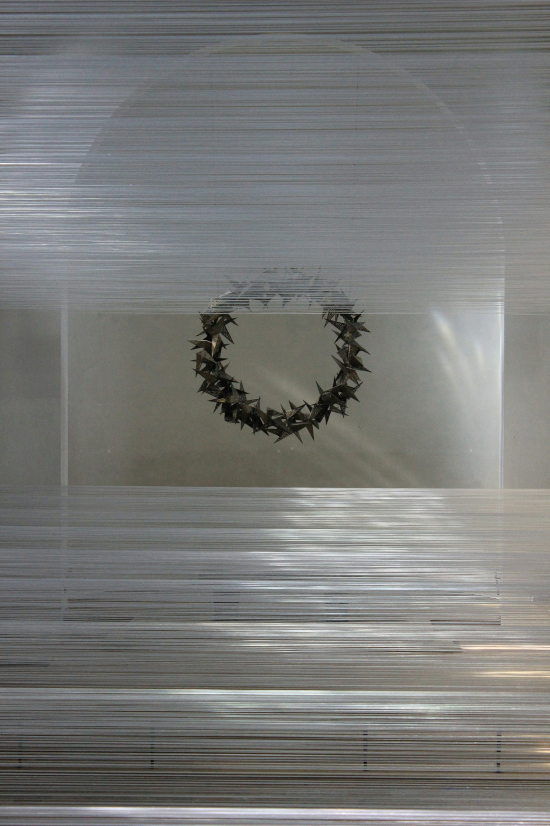 A picture of a wreath hanging on a wall