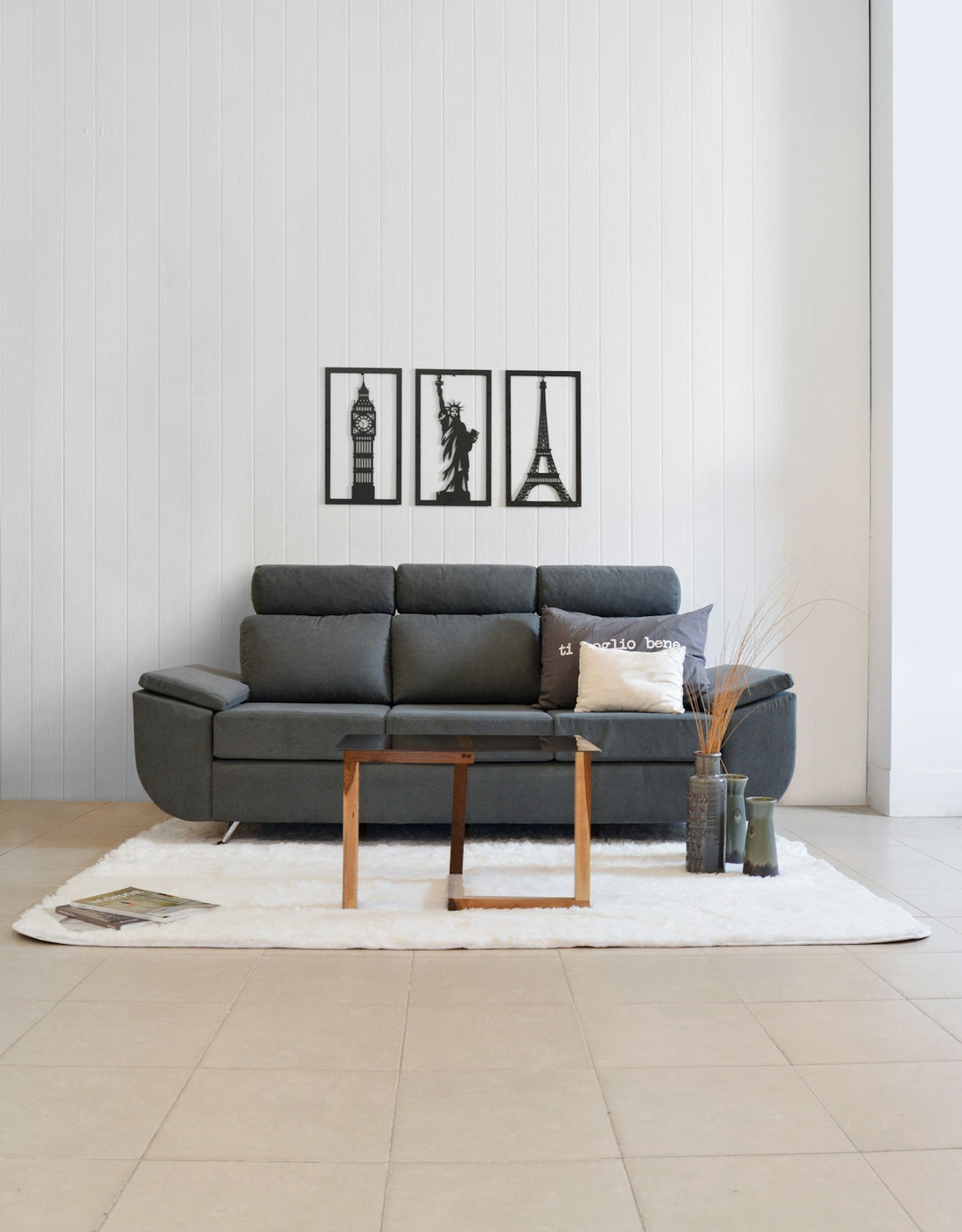 Gray sofa with city landmark art above