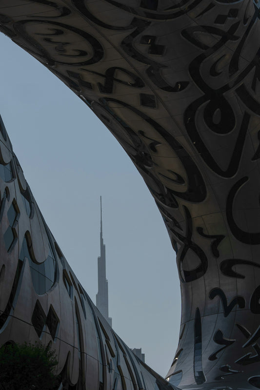 Modern architecture framing a distant skyscraper