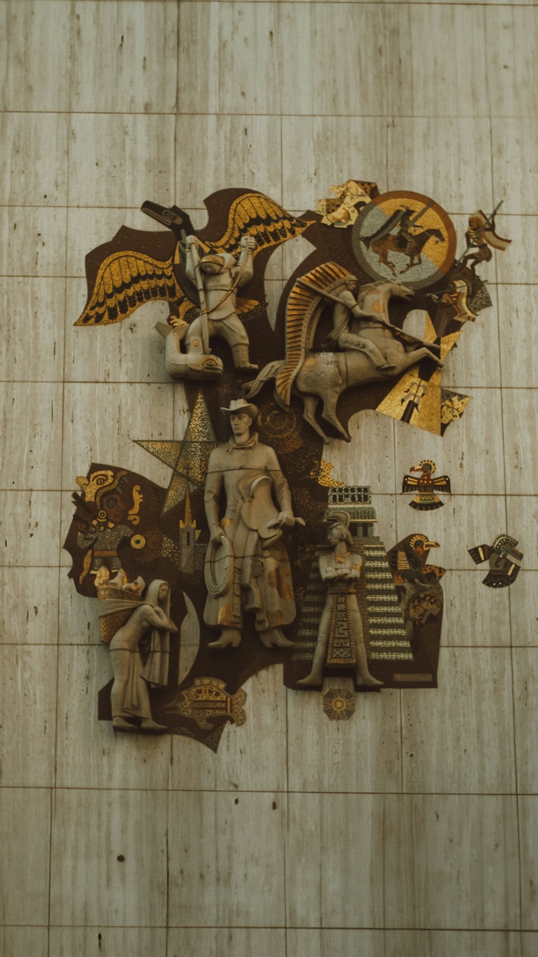 Relief sculpture depicting historical figures and symbols