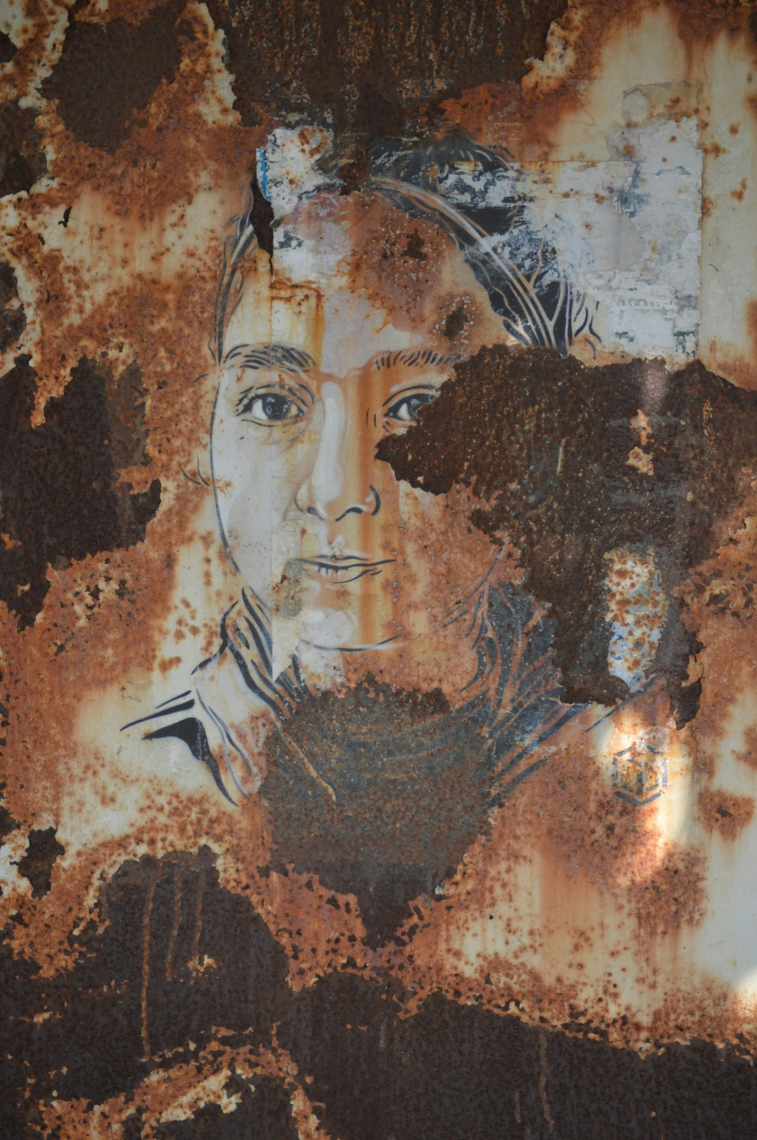 Portrait of a person on rusted metal