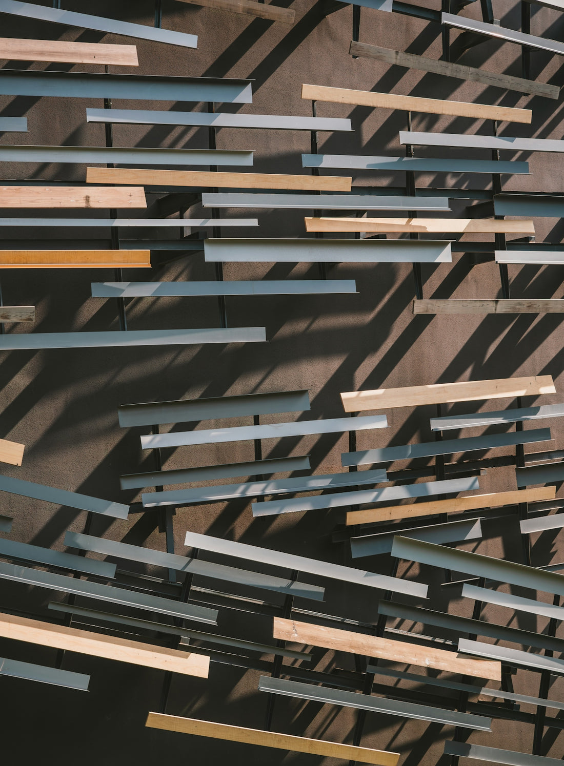 Abstract pattern of horizontal metal and wood bars
